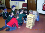 The Cubs playing with the giant Jenga
